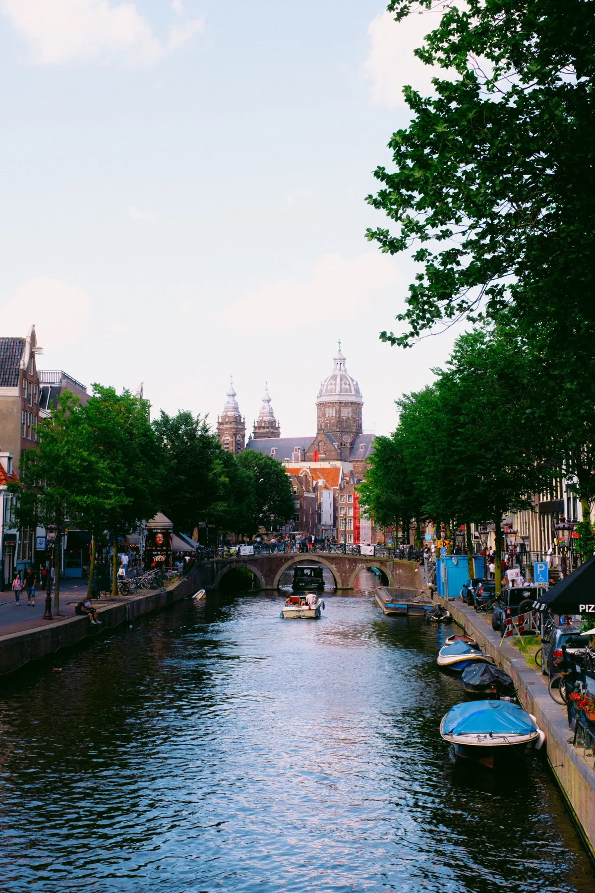 Canal bridge and boats in Amsterdam