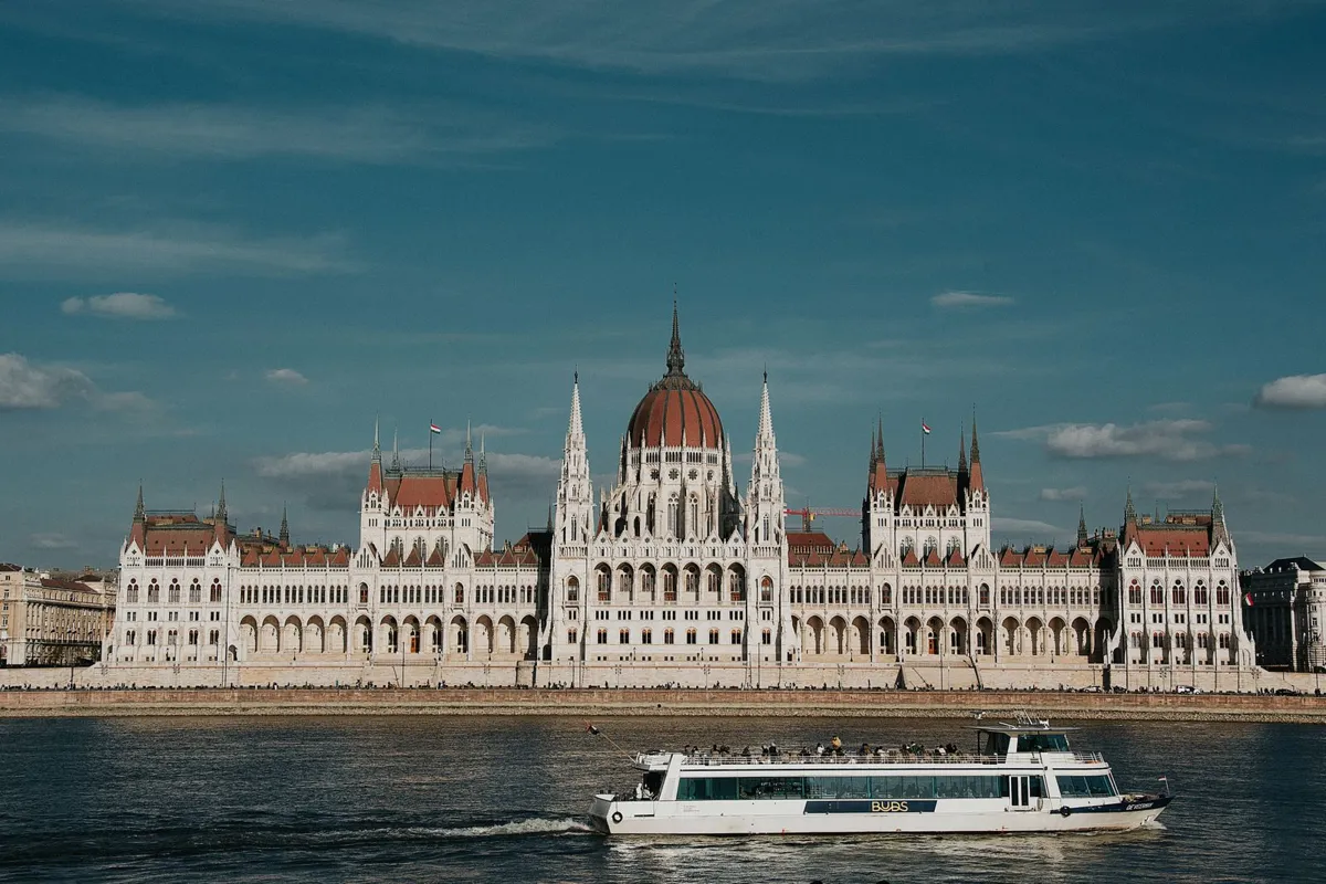A riverboat passing the Parliament building in Budapest