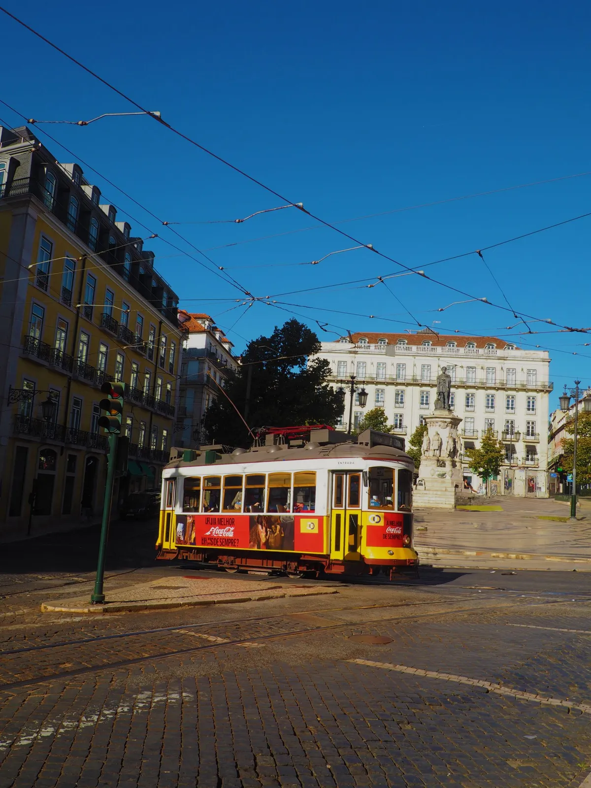 Lisbon tram and buildings around Praca da Figueira