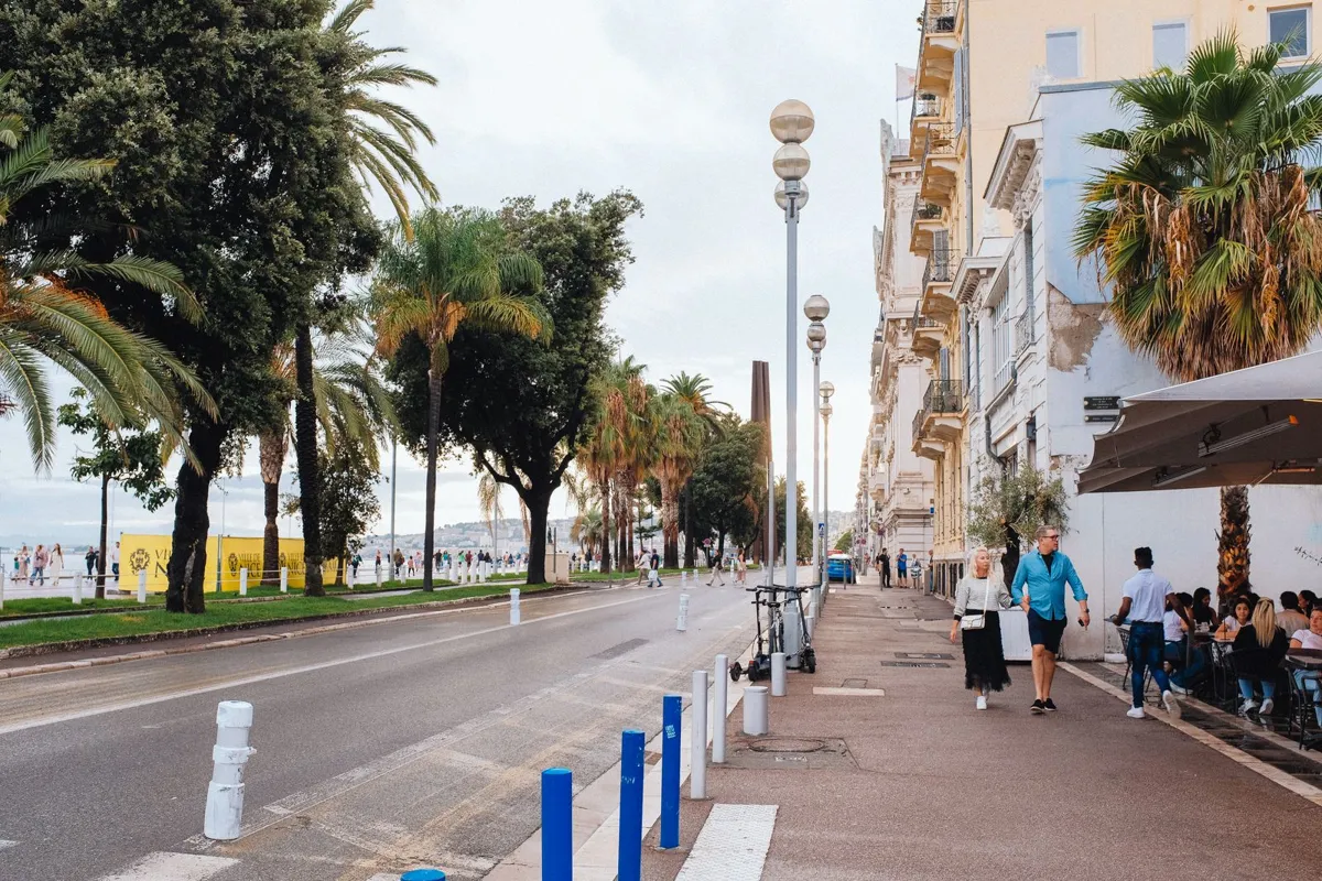 People walking along the Promenade des Anglais in Nice