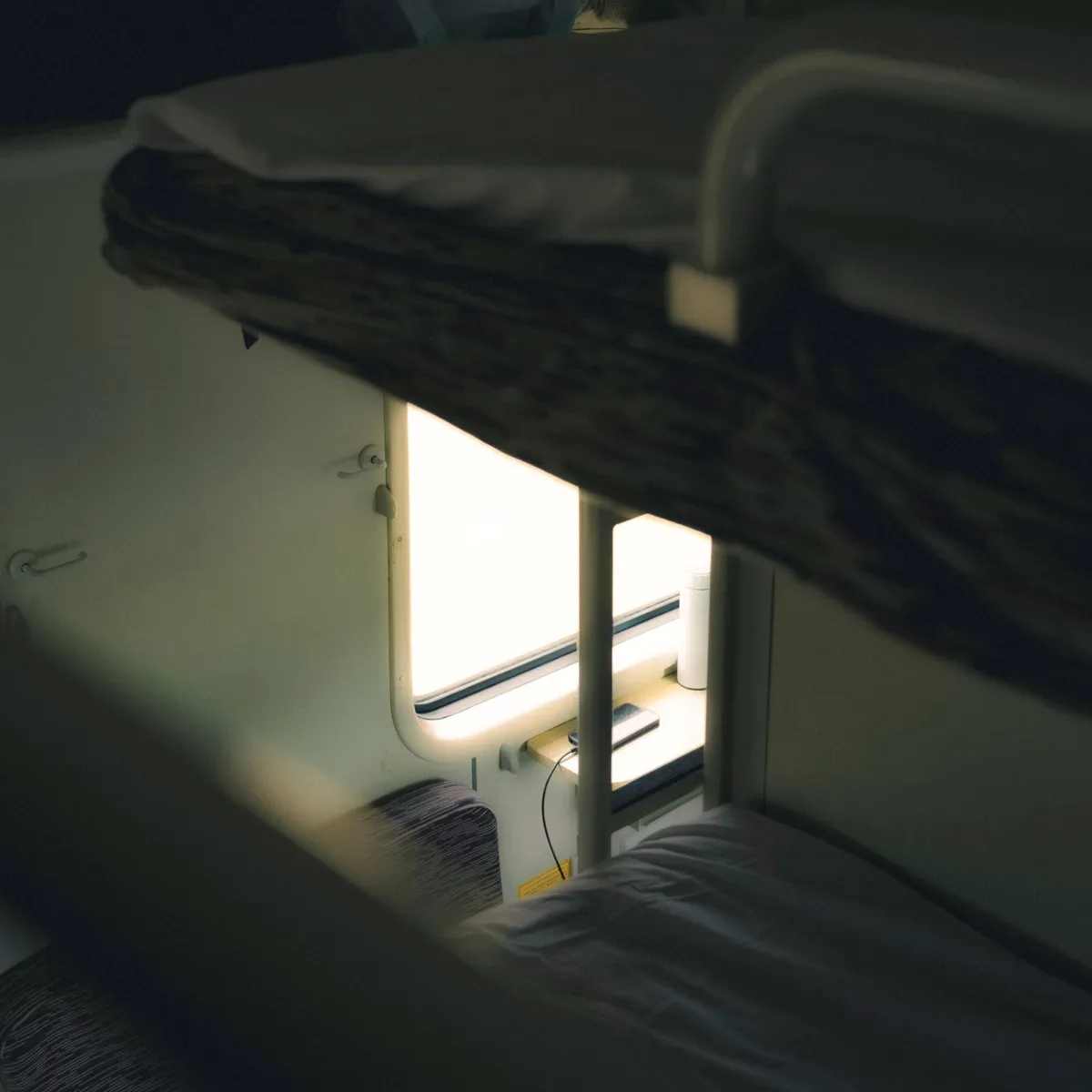Bunk bed inside a sleeper train compartment