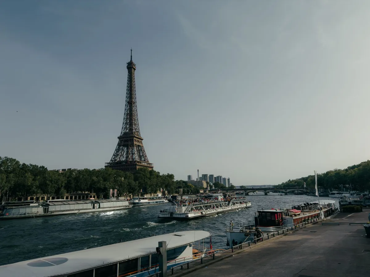 Eiffel Tower and boats along the Seine in Paris