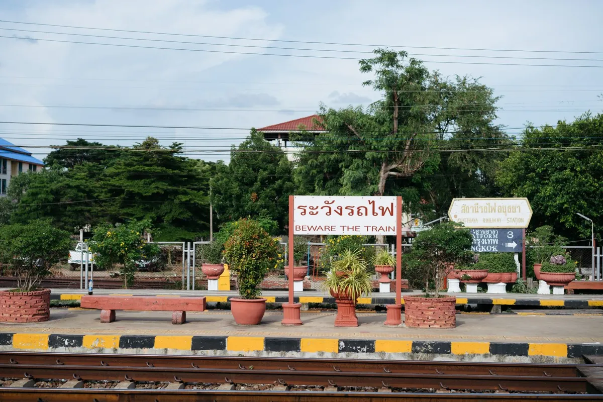 Station platform with information signs