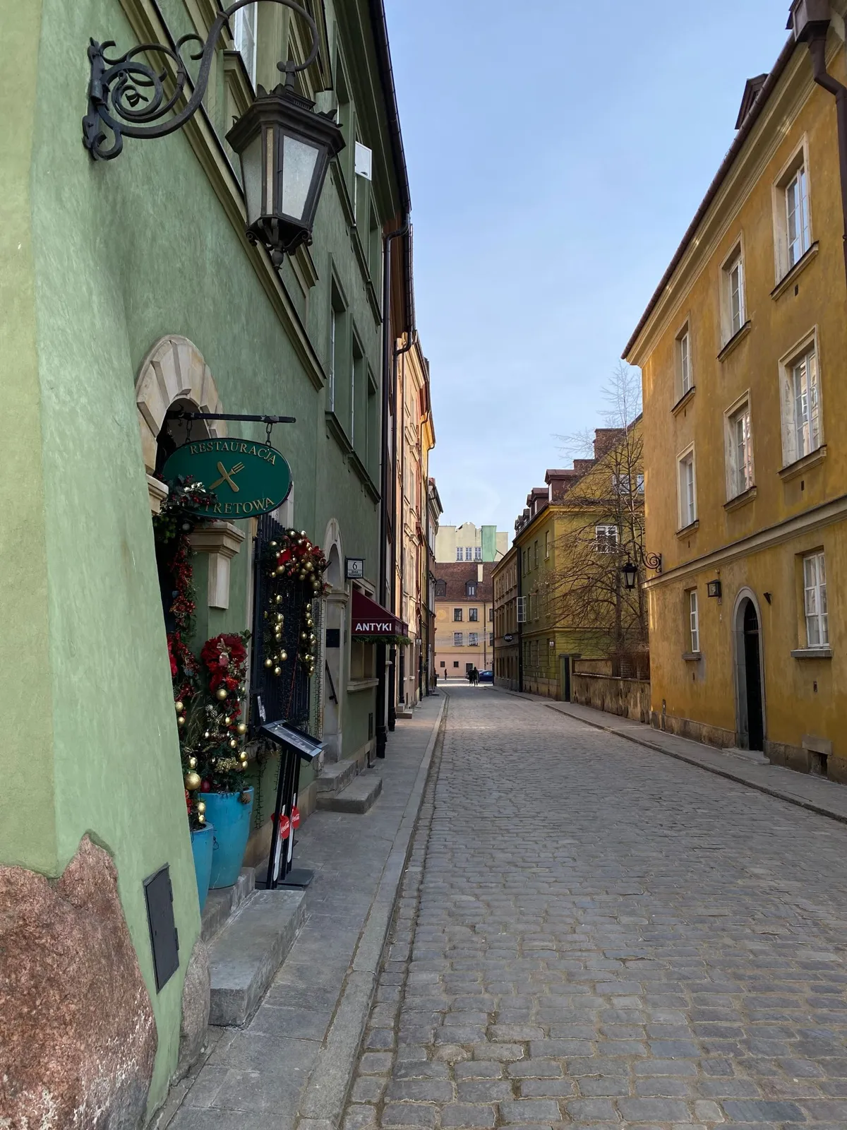 Historic cobbled street in Warsaw Old Town